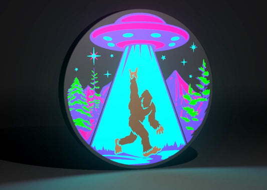 Cyber Neon Sasquatch (Bigfoot) and UFO Inspired Cryptid Wall Sign, Desk Display, or Shelf Souvenir which is internally illuminated with high density LEDs and USB powered. Purchase available for limited time.