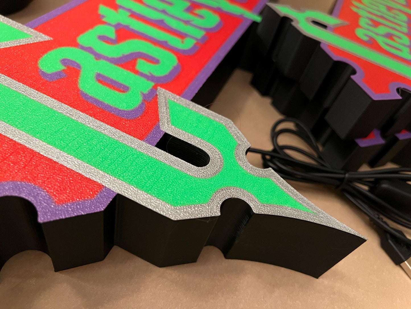 Close-up of the Castlevania (1986) Inspired 3D Wall Sign, Desk Display, or Shelf Souvenir which is internally illuminated with high density LEDs and USB powered. Purchase available for limited time.
