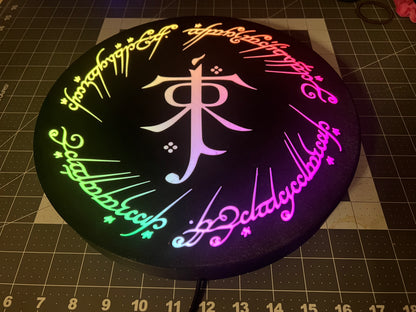 LOTR Tolkien Monogram & The One Ring Script Wall Sign, Desk Display, or Shelf Souvenir which is internally illuminated with high density LEDs and USB powered. Purchase available for limited time.