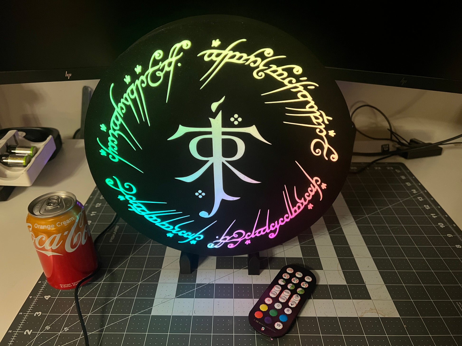 LOTR Tolkien Monogram & The One Ring Script Wall Sign, Desk Display, or Shelf Souvenir which is internally illuminated with high density LEDs and USB powered. Purchase available for limited time.