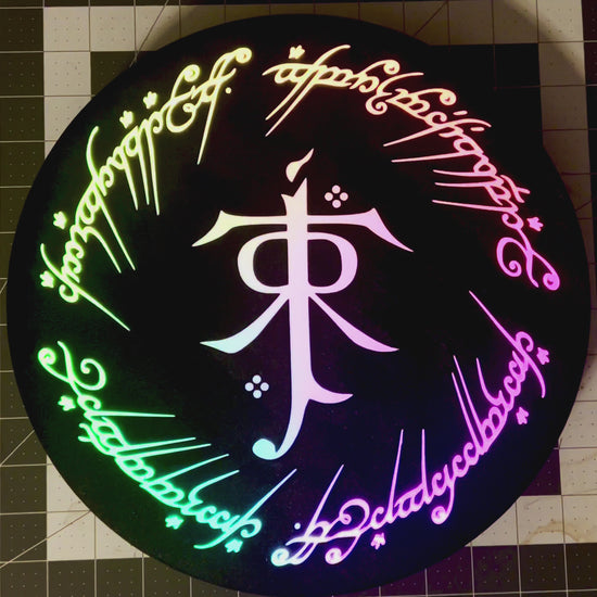 LOTR Tolkien Monogram & The One Ring Script Wall Sign, Desk Display, or Shelf Souvenir which is internally illuminated with high density LEDs and USB powered. Purchase available for limited time.