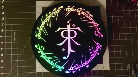 LOTR Tolkien Monogram & The One Ring Script Wall Sign, Desk Display, or Shelf Souvenir which is internally illuminated with high density LEDs and USB powered. Purchase available for limited time.