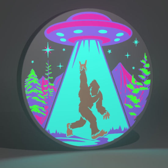 Cyber Neon Sasquatch (Bigfoot) and UFO Inspired Cryptid Wall Sign, Desk Display, or Shelf Souvenir which is internally illuminated with high density LEDs and USB powered. Purchase available for limited time.