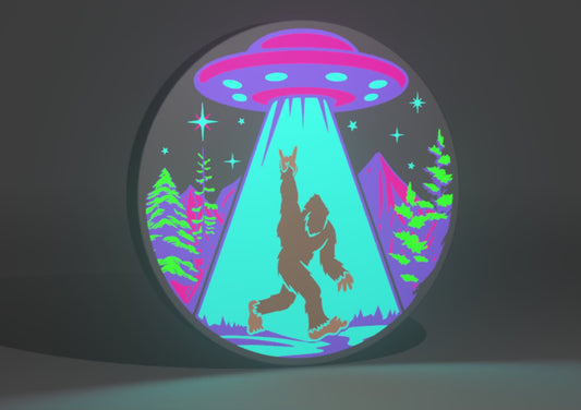Cyber Neon Sasquatch (Bigfoot) and UFO Inspired Cryptid Wall Sign, Desk Display, or Shelf Souvenir which is internally illuminated with high density LEDs and USB powered. Purchase available for limited time.